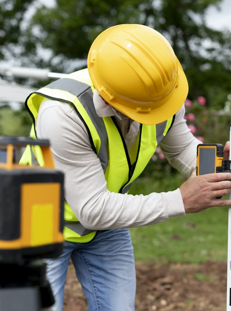 contractor-land-surveying-the-backyard.jpg